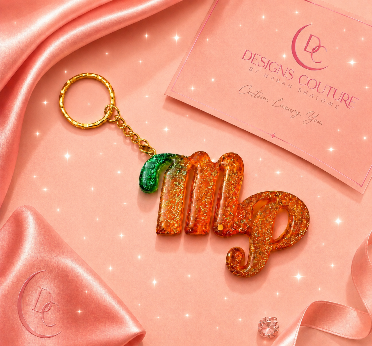 Custom Virgo resin keychain styled on a soft pink backdrop